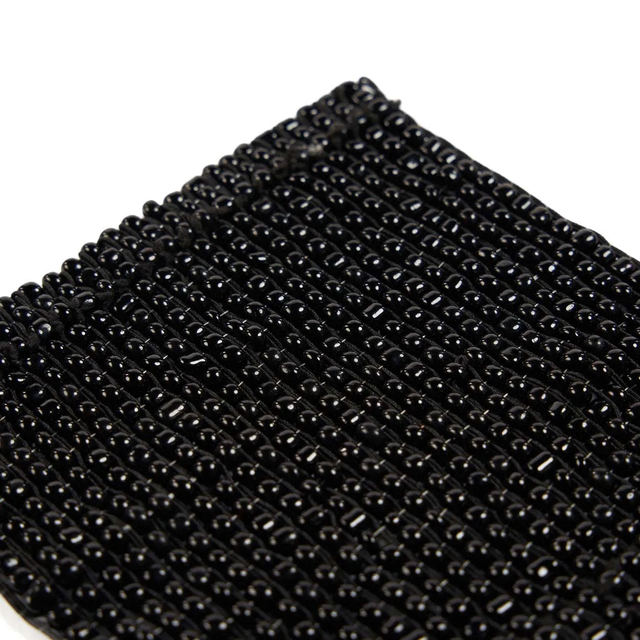 El salvamanteles Perles - Negro