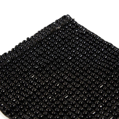 El salvamanteles Perles - Negro