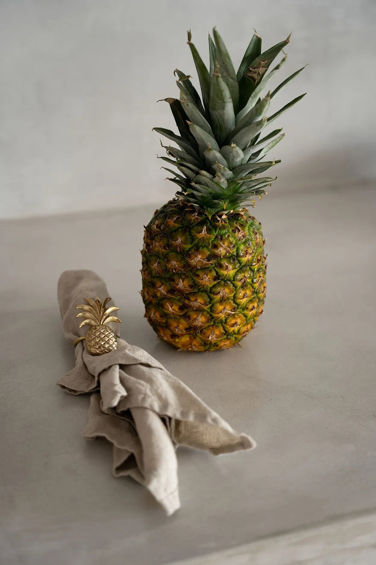 El servilletero de piña - dorado