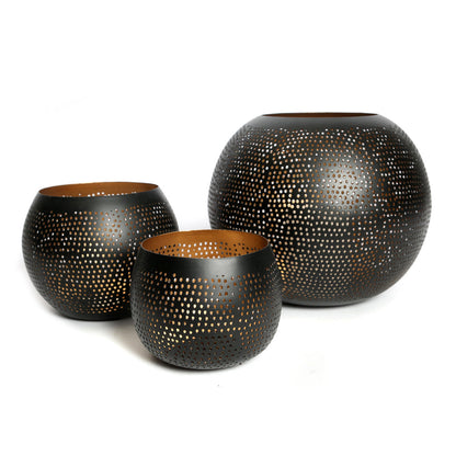 La esfera perforada - oro negro - S